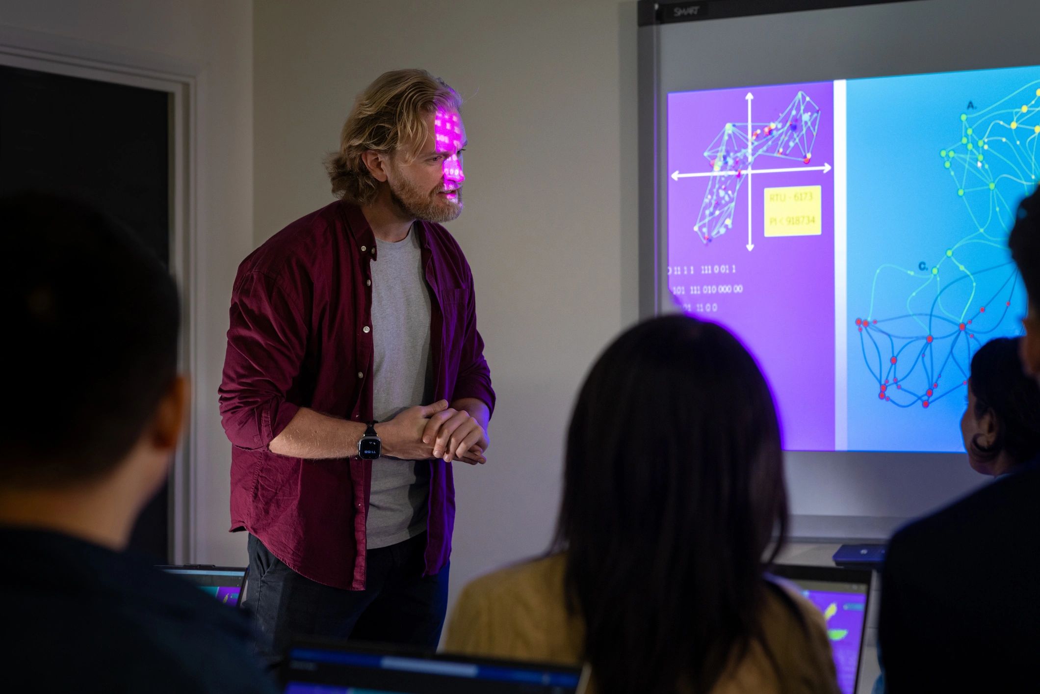 Research seminar with presenter and projected findings