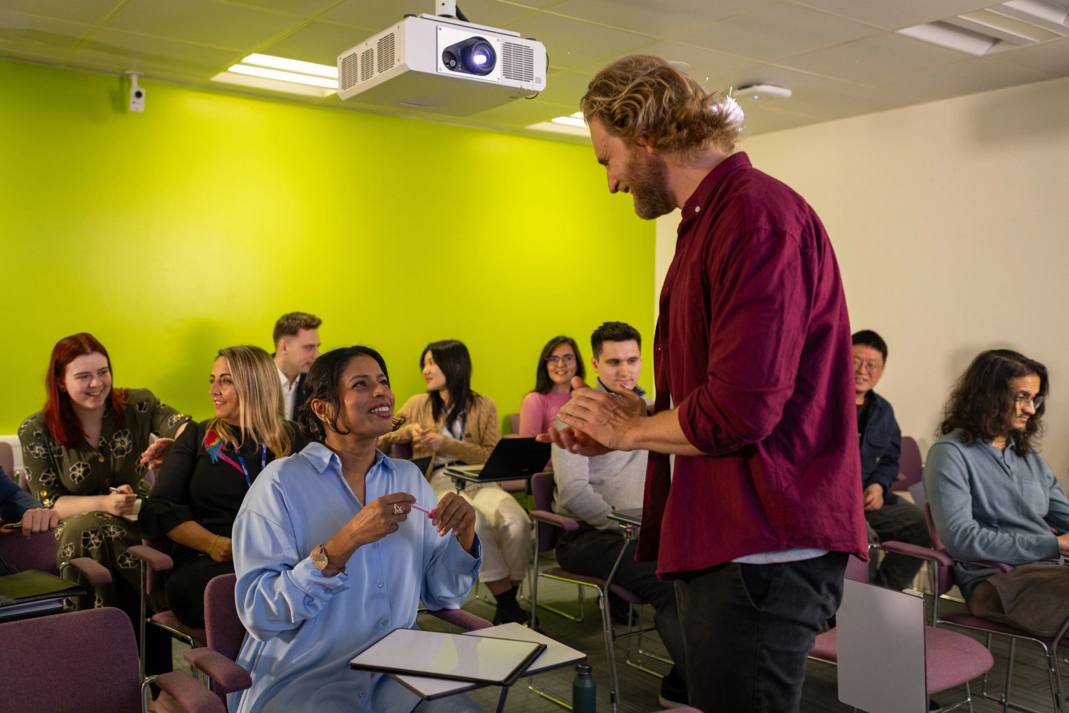 Research professionals collaborating during a seminar